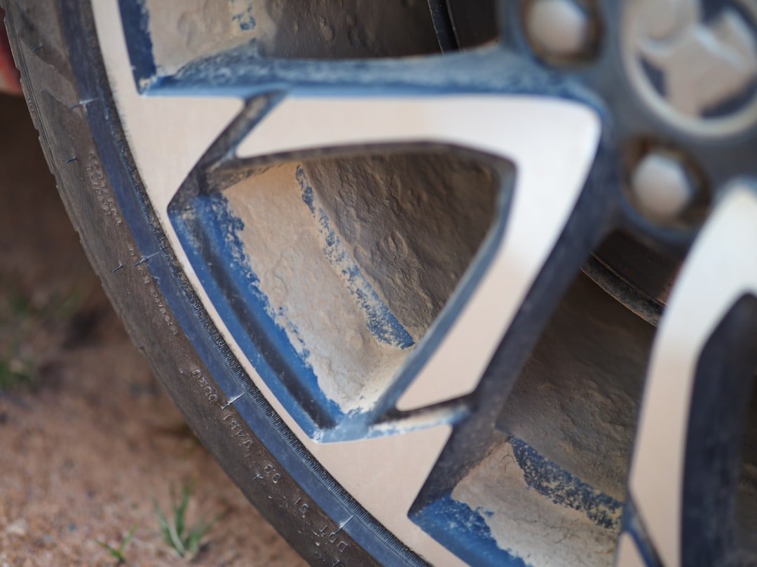 A wheel rim showing curb rash damage