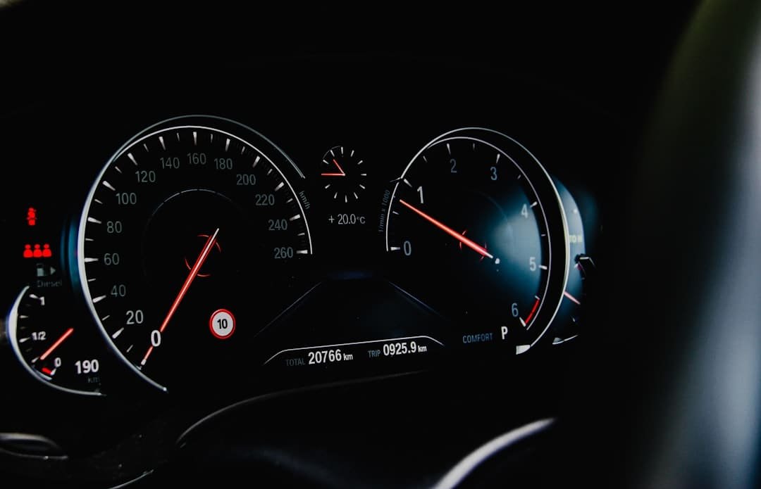 Close-up of a car odometer showing vehicle mileage