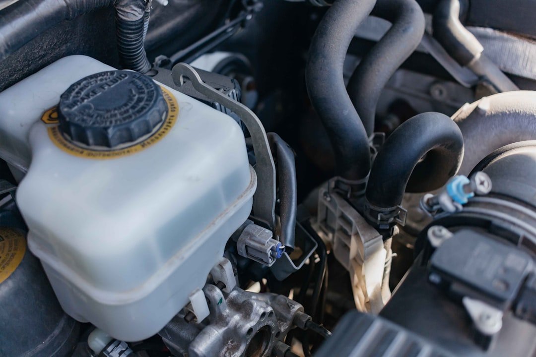 Brake fluid reservoir cap in a vehicle engine bay