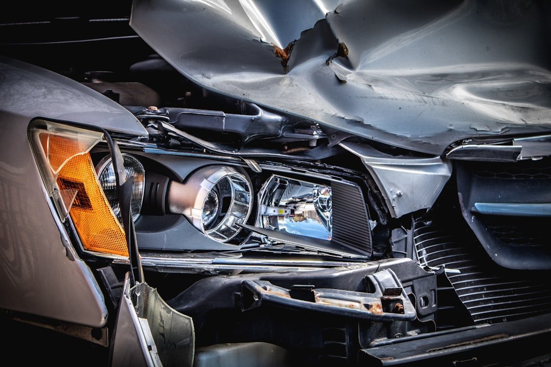 A damaged headlight assembly with a cracked lens