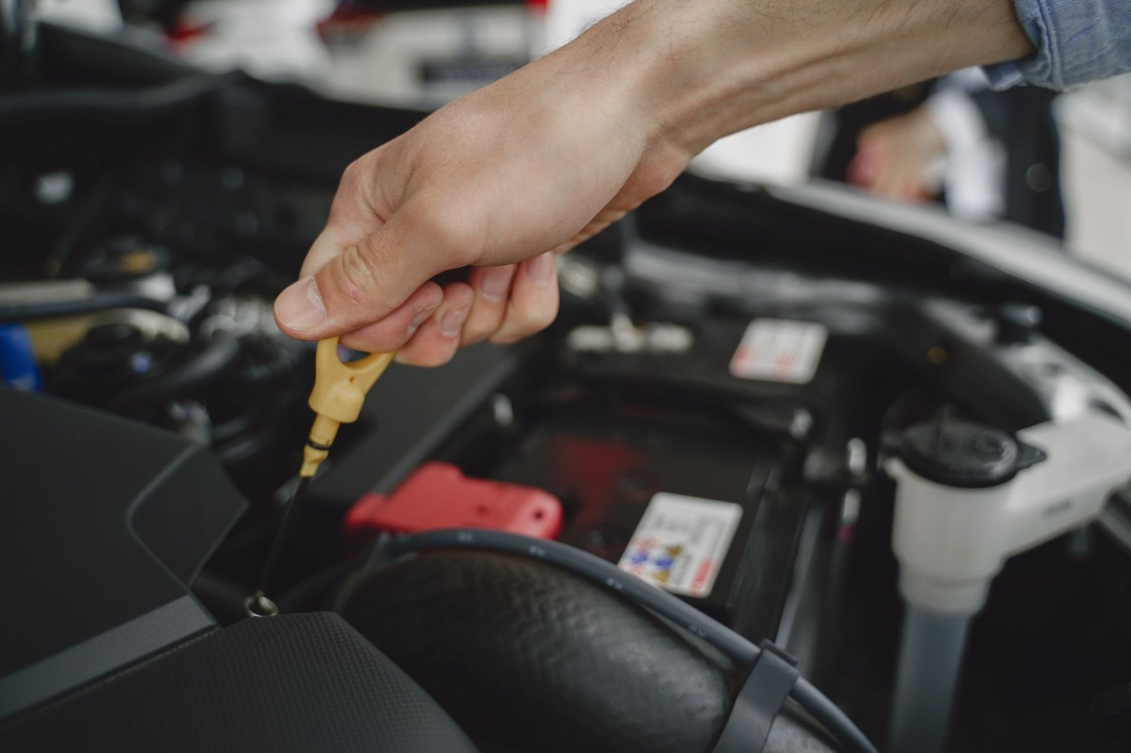 Checking under the hood near the battery and charging system