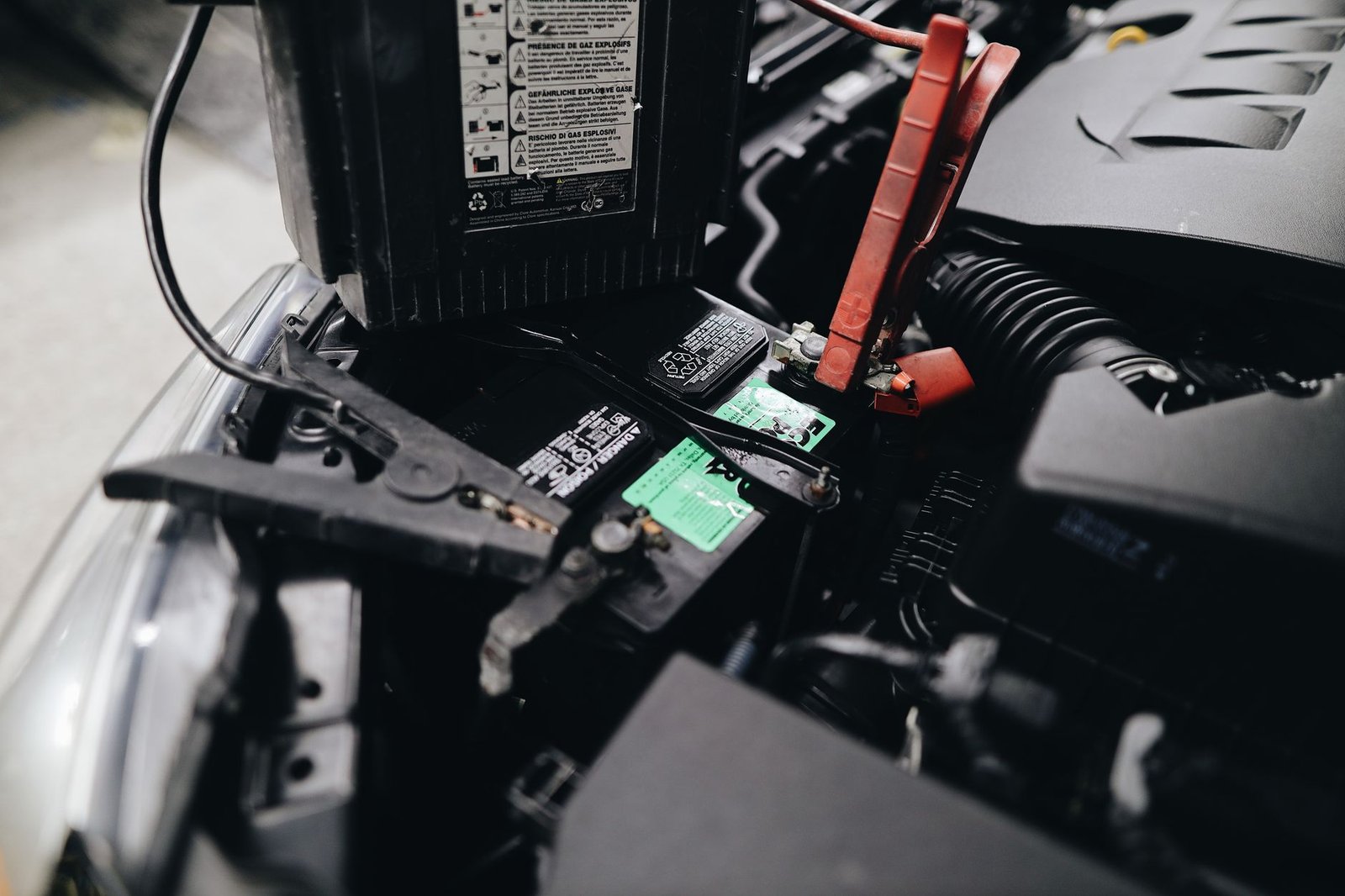Close-up view of a car battery and terminal connections
