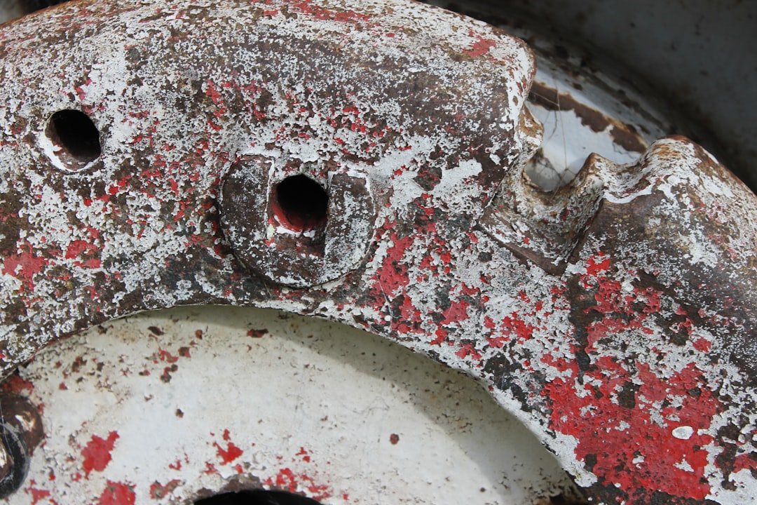 An old worn brake caliper part