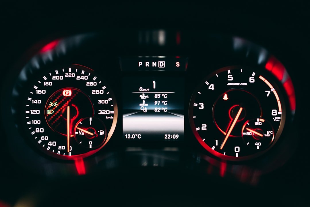Vehicle gauge cluster showing temperature readings