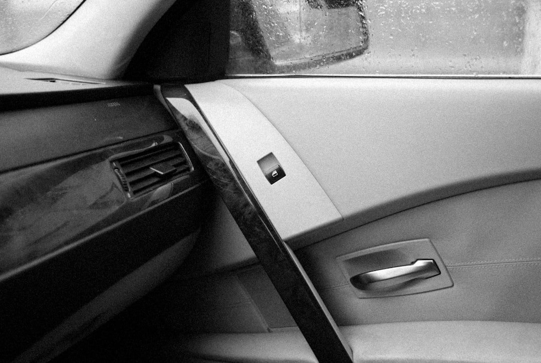 Open car door frame, where compliance and VIN labels are commonly located