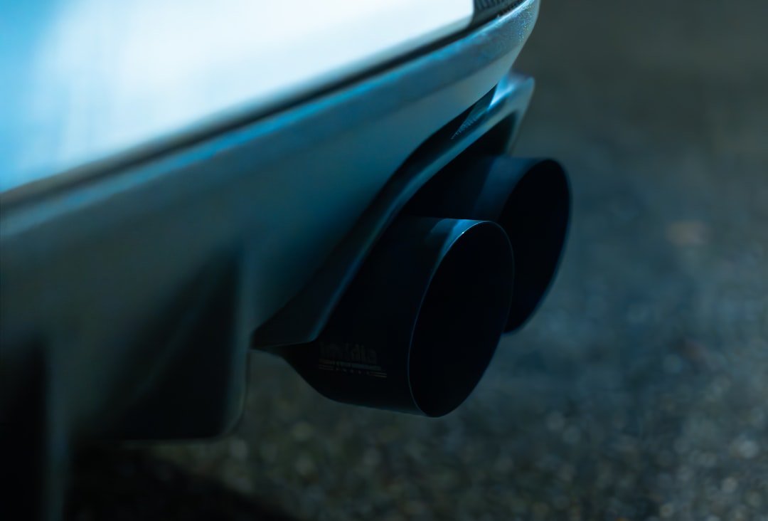 A car's exhaust tailpipe closeup