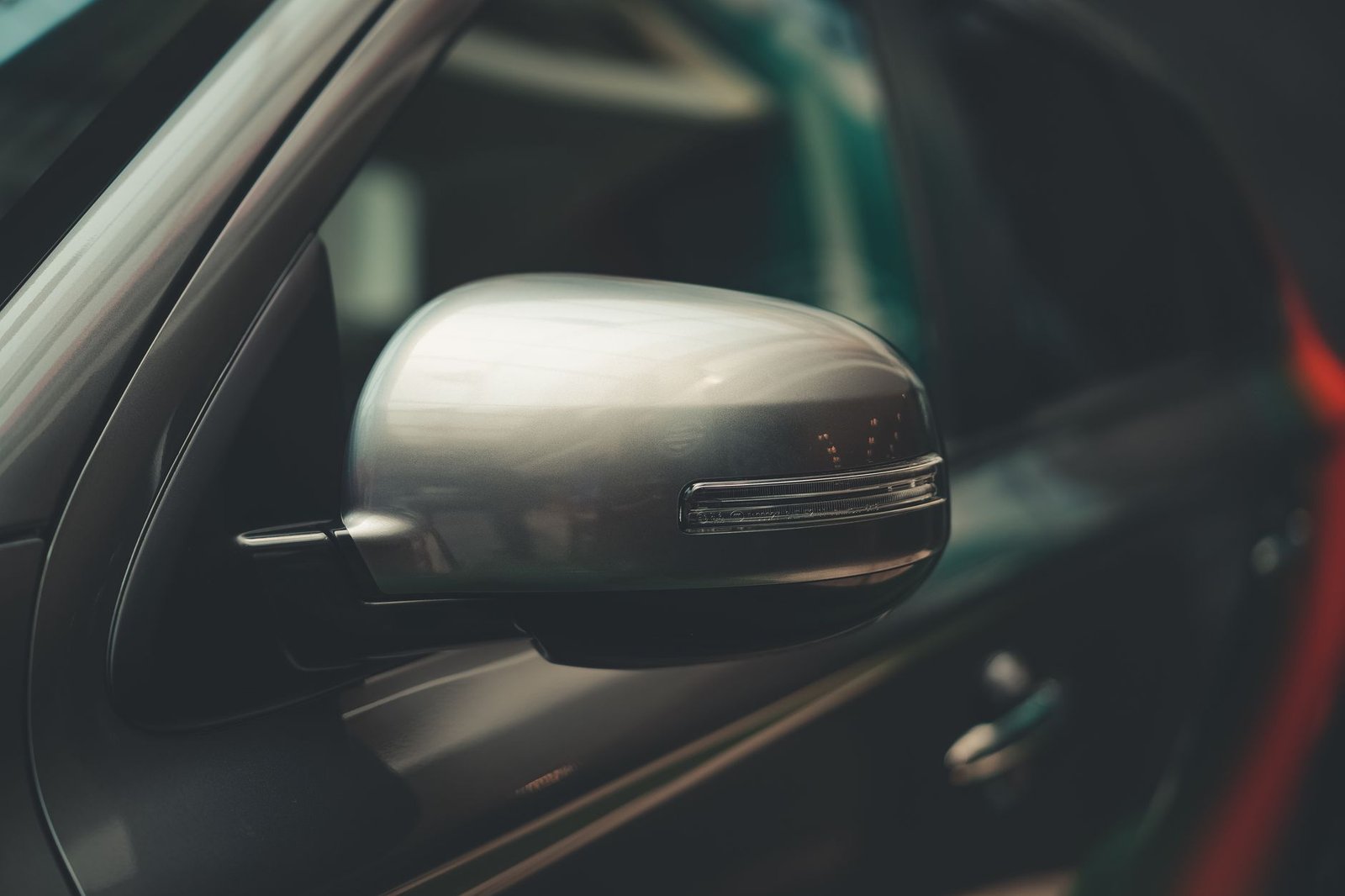 A car side mirror housing closeup