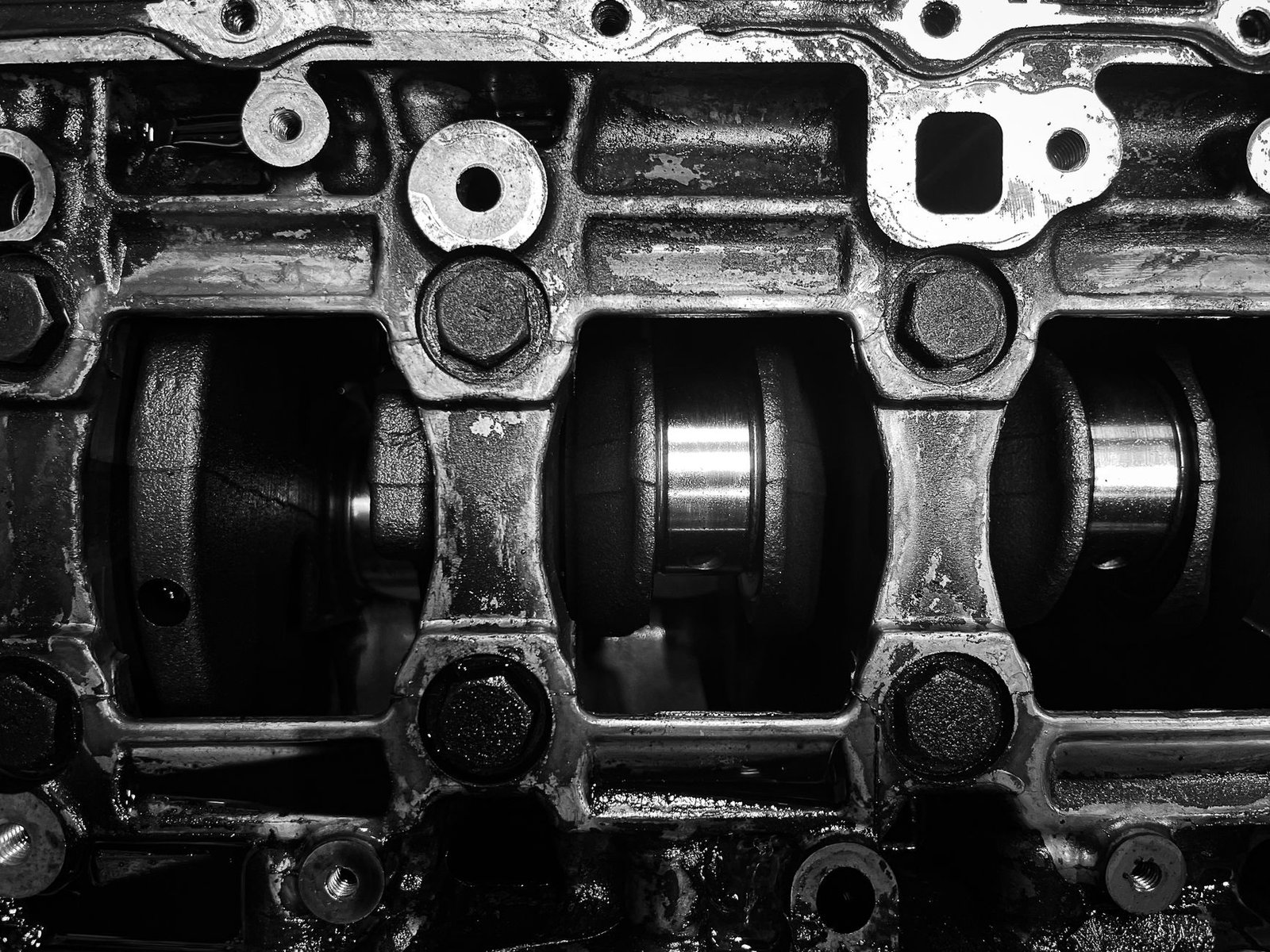 An engine block interior showing bearing journals