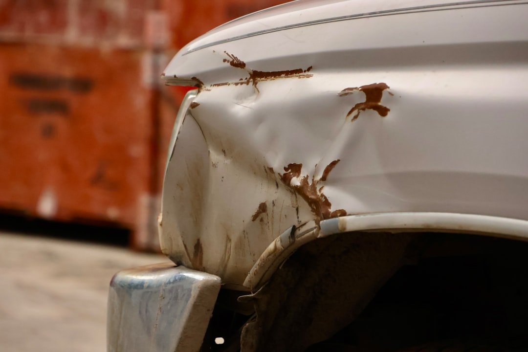 A damaged fender panel showing a dent