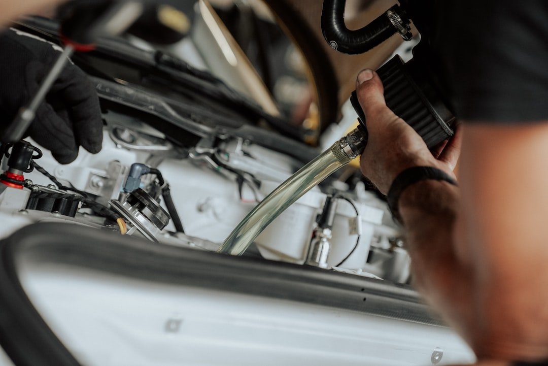 Inspecting an engine coolant hose for leaks