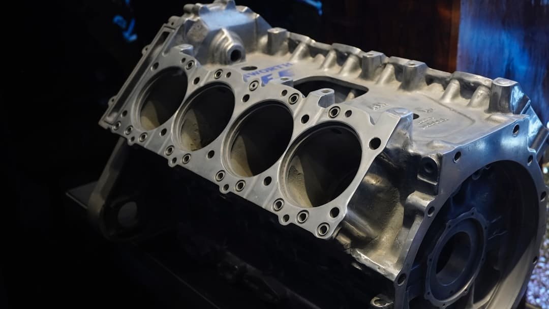 Close-up of a rebuilt automotive engine block on a workbench