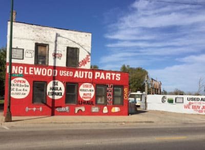 Englewood Used Auto Parts red and white storefront with hand-painted signage at 620 West 59th Street, Chicago, IL