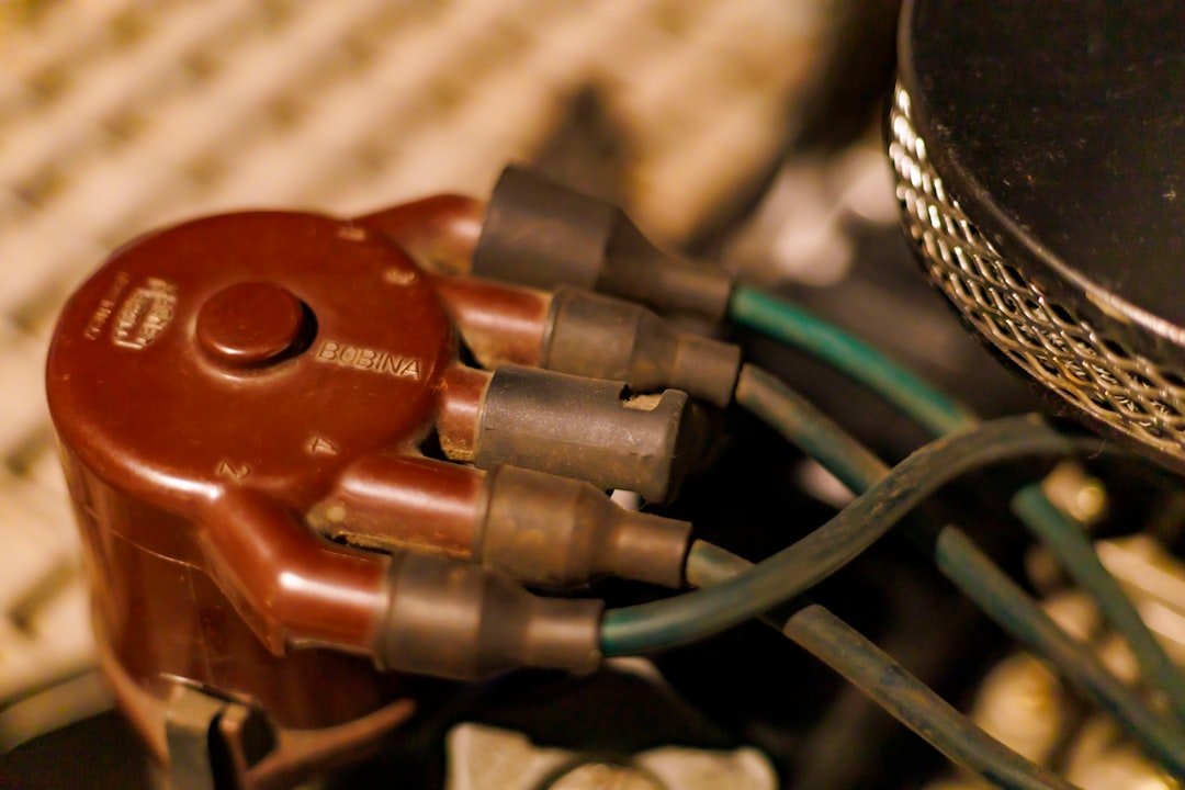 An ignition component held for inspection
