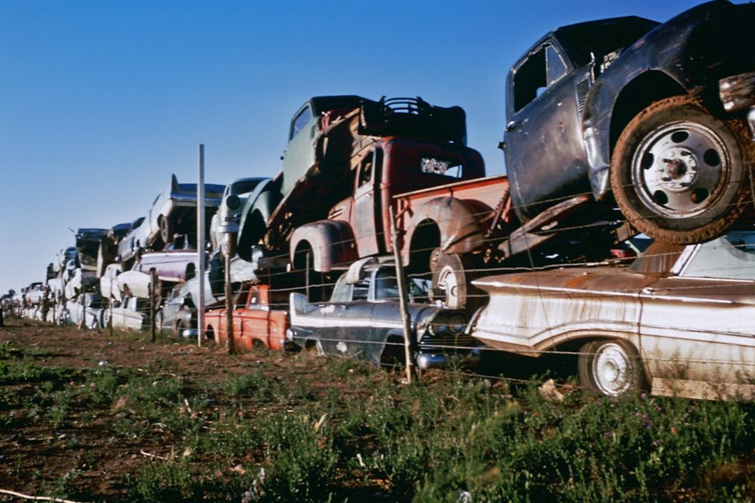 Stacked wrecked cars at a junkyard