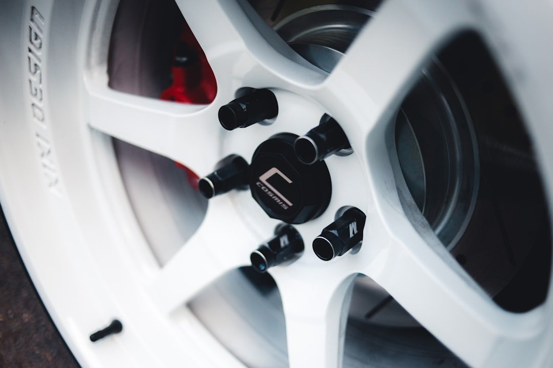 Close-up of lug nuts on a wheel hub