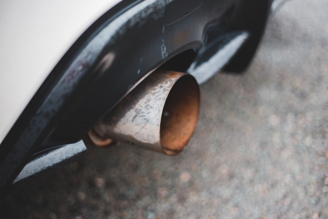 A rusted muffler tailpipe