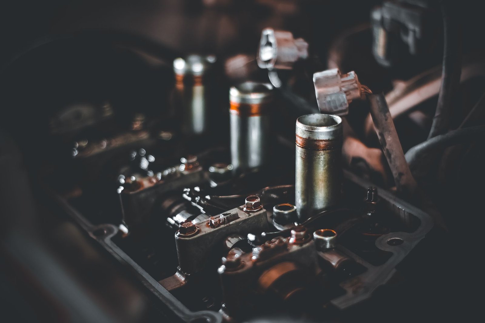Spark plug wells on an engine cylinder head