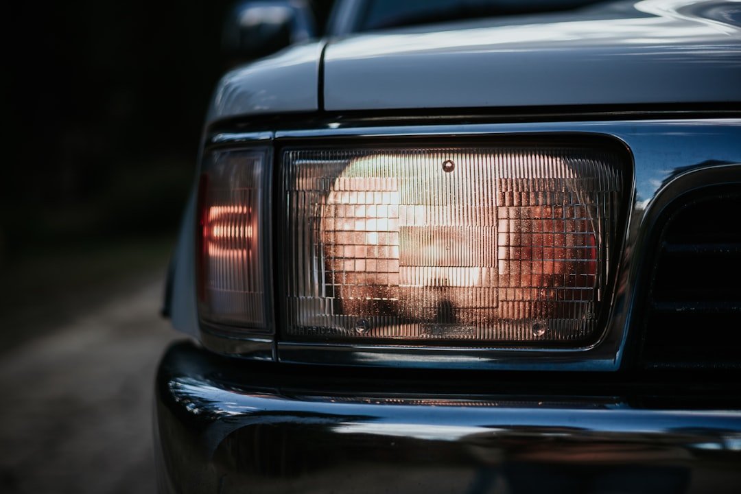 A pickup truck's headlight closeup
