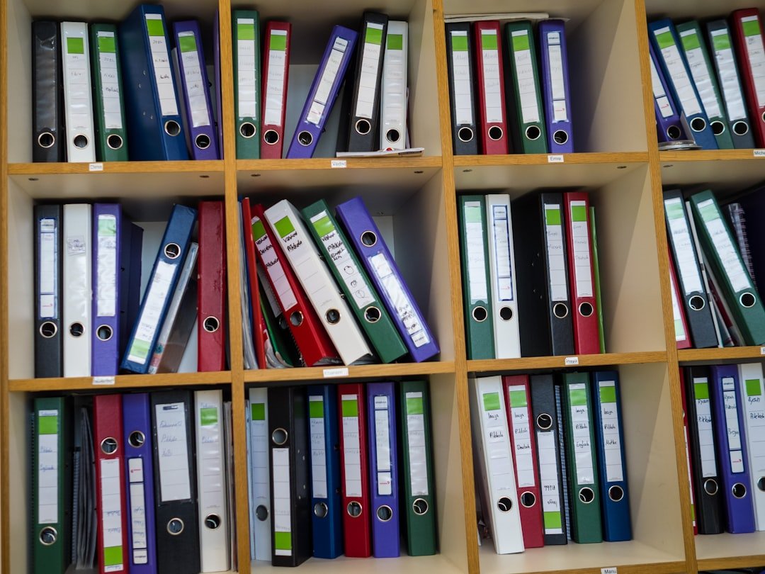 Parts catalog reference binders on a shelf