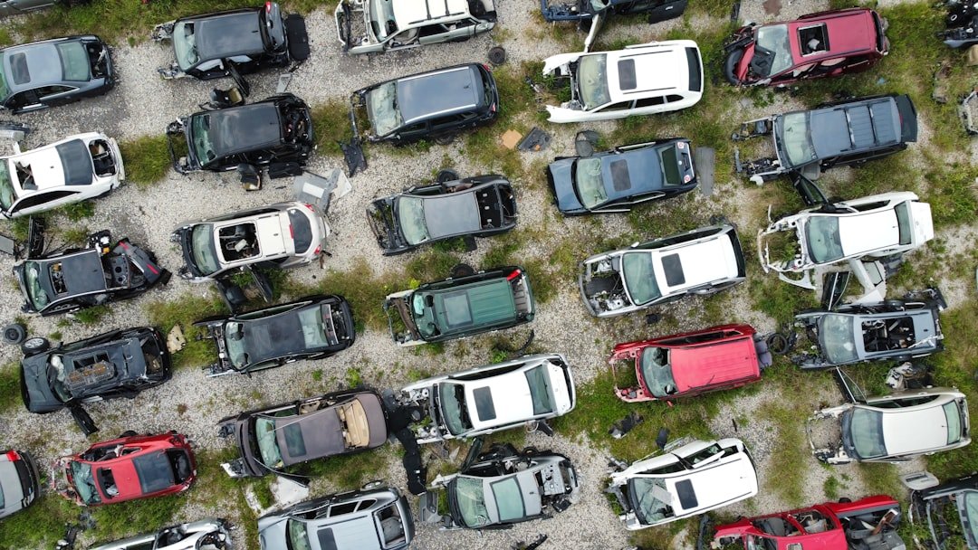 Rows of vehicles at a salvage auction yard