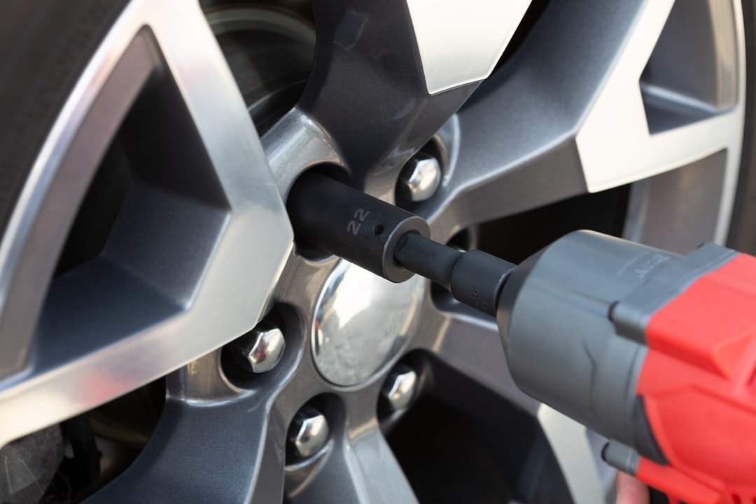 An impact wrench on a wheel lug