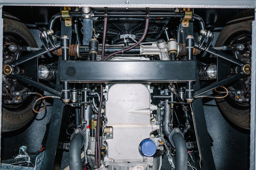 A truck's front suspension and steering assembly viewed from underneath