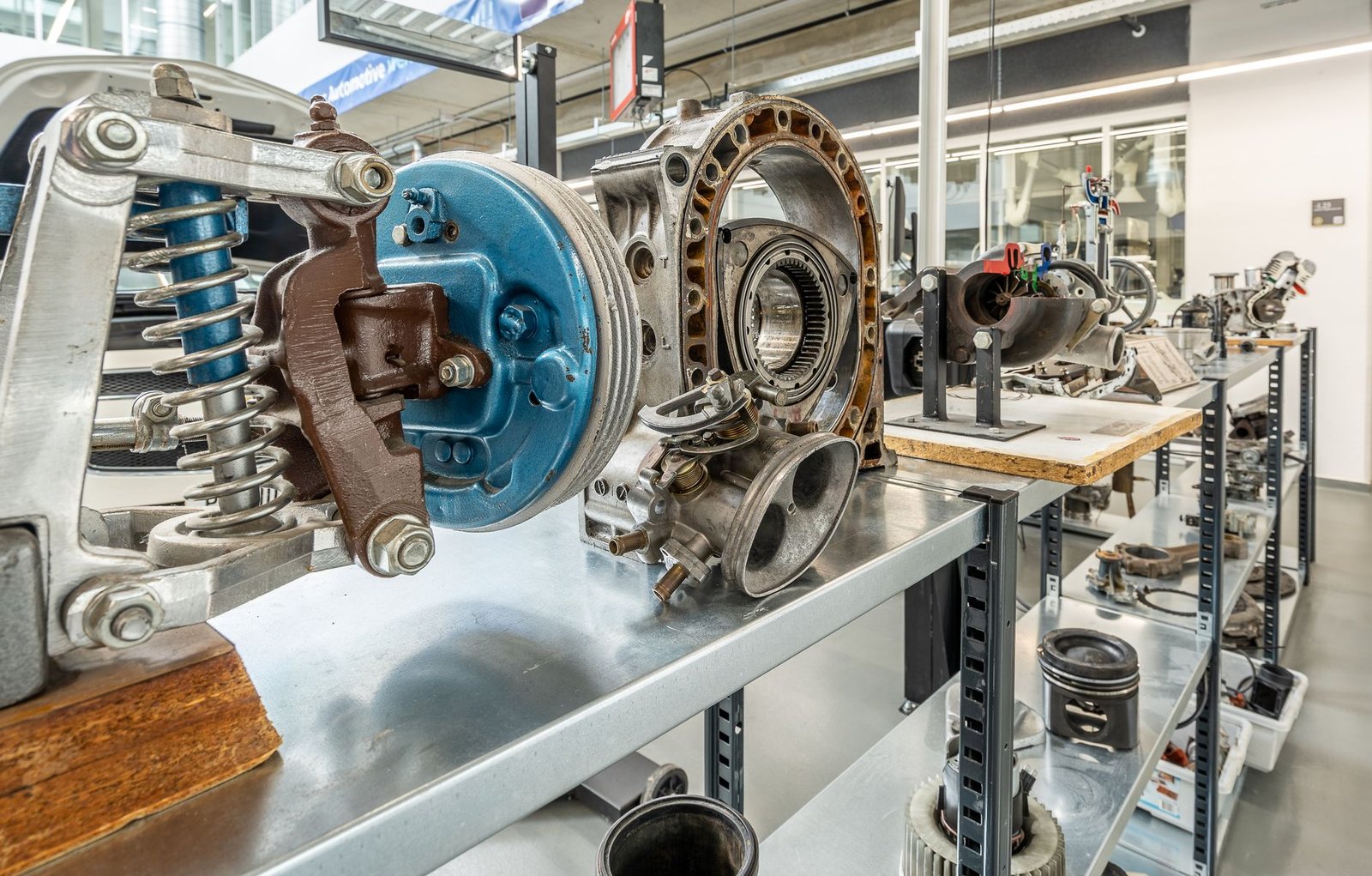 Automotive parts including a turbocharger on a workbench display
