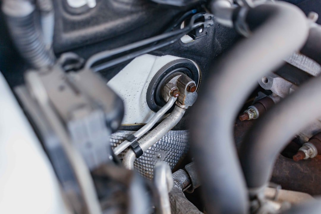 A turbocharger oil line connection in an engine bay