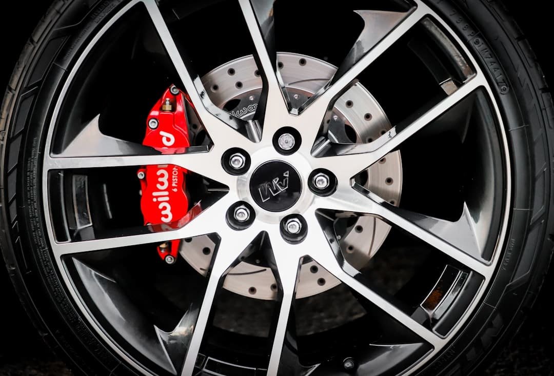 Close-up of a used alloy wheel and rim with brake caliper