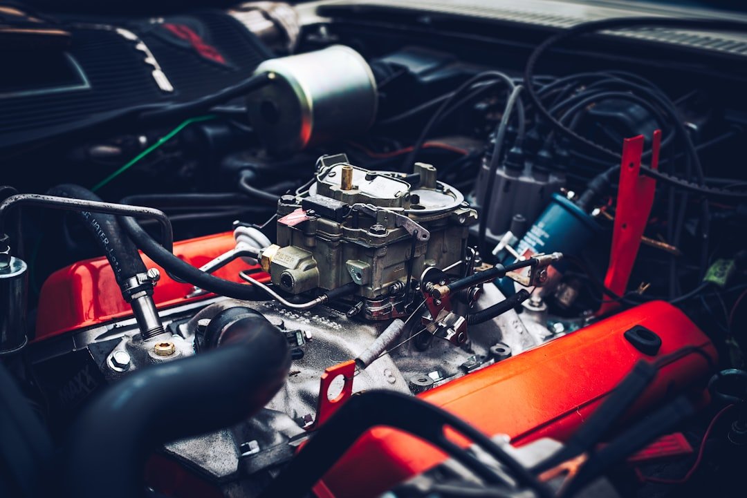 A car engine bay showing fuel delivery components